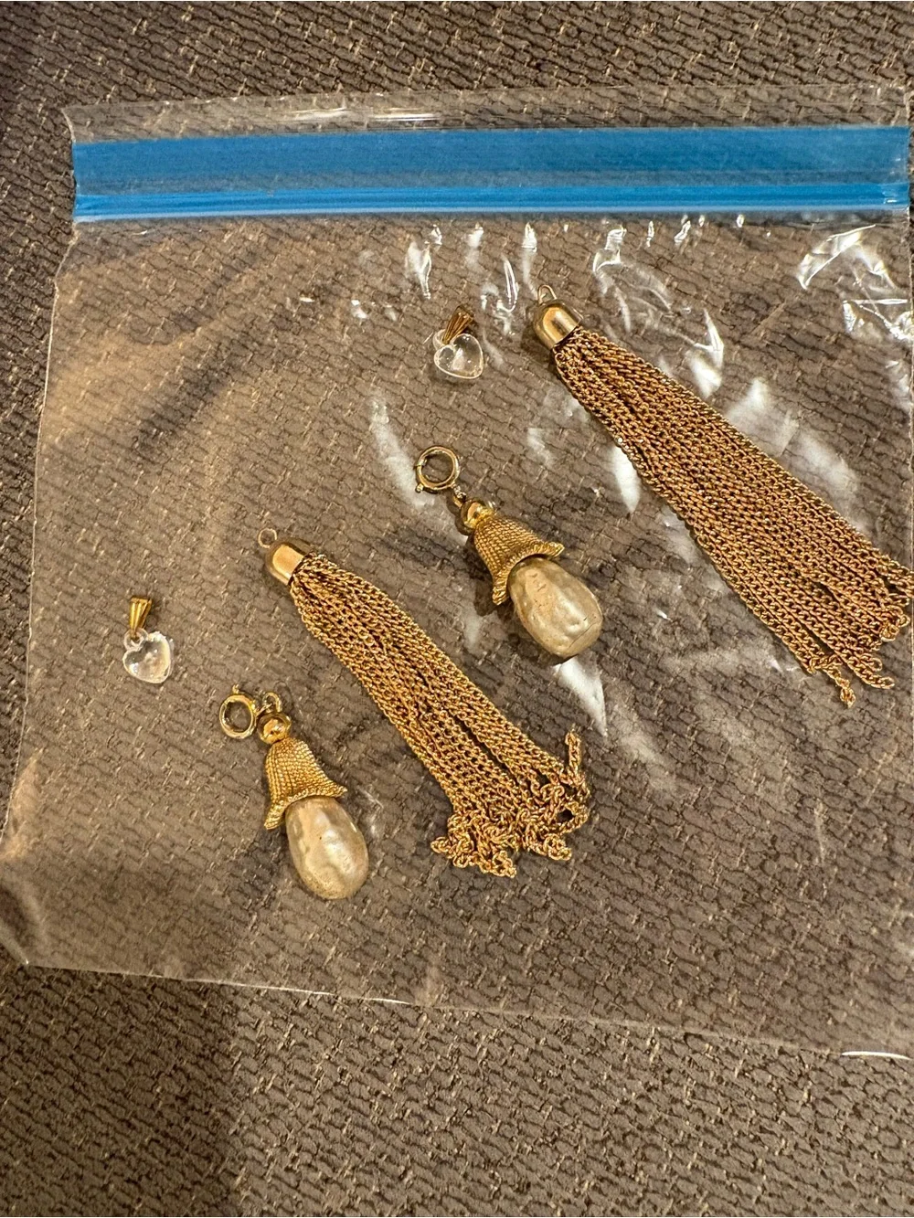 Assortment of Gold tone, Pearl ,Tassel, and heart Accessories- 2 sets